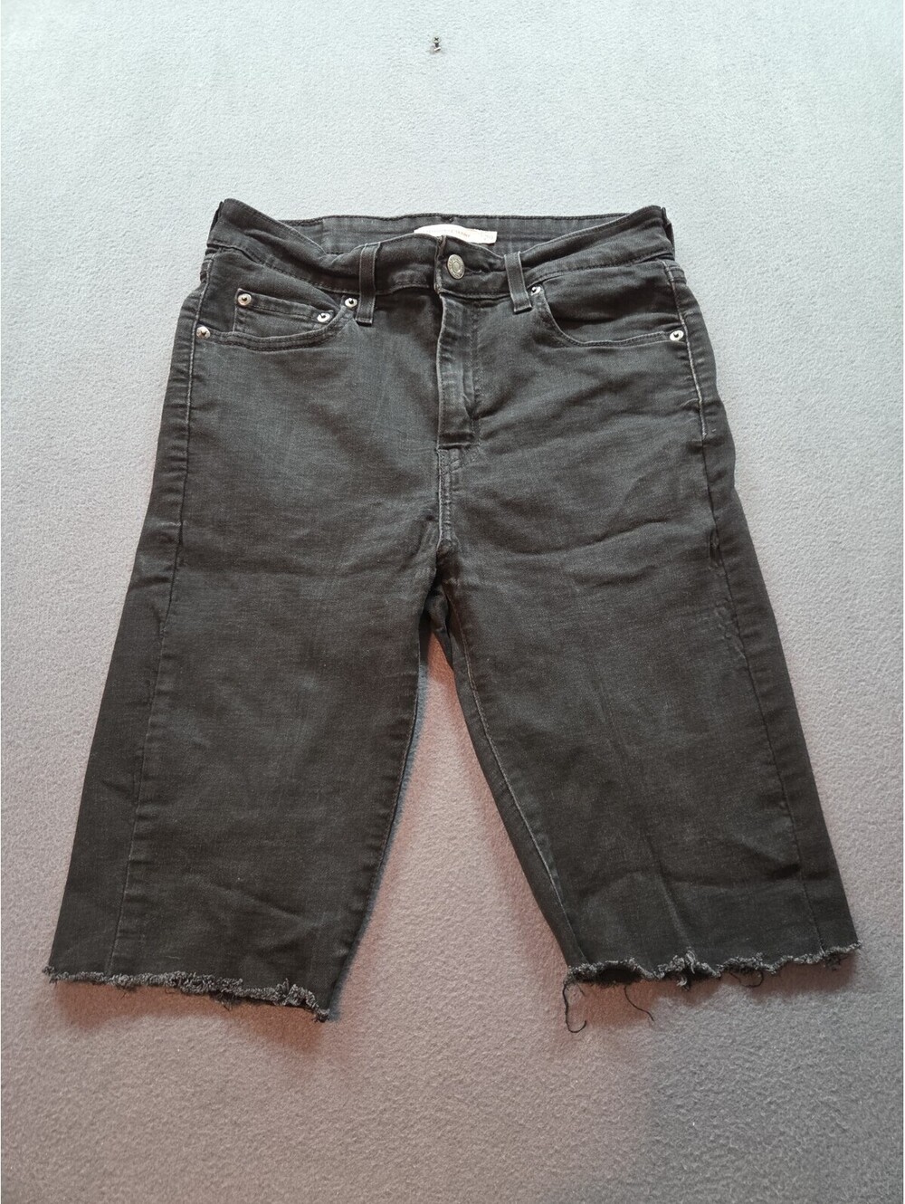 women's black 721 high rise skinny cut off jean shorts by Levi's size 29W